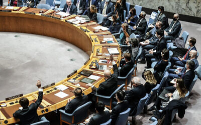 Representatives attend a UN Security Council meeting on the Russian invasion of Ukraine, on Friday, February 25, 2022, at UN headquarters. Russia vetoed a Security Council resolution demanding that Moscow stop its attack on Ukraine and withdraw all troops. Friday’s vote was 11-1, with China, India, and the United Arab Emirates abstaining. It showed significant but not total opposition to Russia’s invasion of its smaller, militarily weaker neighbor. (AP Photo/John Minchillo)