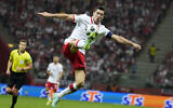 Poland's Robert Lewandowski controls the ball during the World Cup 2022 group I qualifying soccer match between Poland and England, at the Narodowy stadium in Warsaw, on September 8, 2021. (AP Photo/Czarek Sokolowski, File)