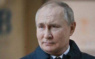 Russian President Vladimir Putin looks on as he visits the construction site of the National Space Agency on the premises of the Khrunichev State Research and Production Space Centre in Moscow, Russia, February 27, 2022. (Sergei Guneyev, Sputnik, Kremlin Pool Photo via AP)