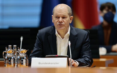 German Chancellor Olaf Scholz arrives for a security cabinet meeting at the Chancellery in Berlin, Germany, February 28, 2022. (AP Photo/Hannibal Hanschke, Pool)