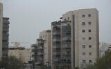 A dusty haze settles in over the city of Beersheba in southern Israel, February 4, 2022. (Emanuel Fabian/The Times of Israel)