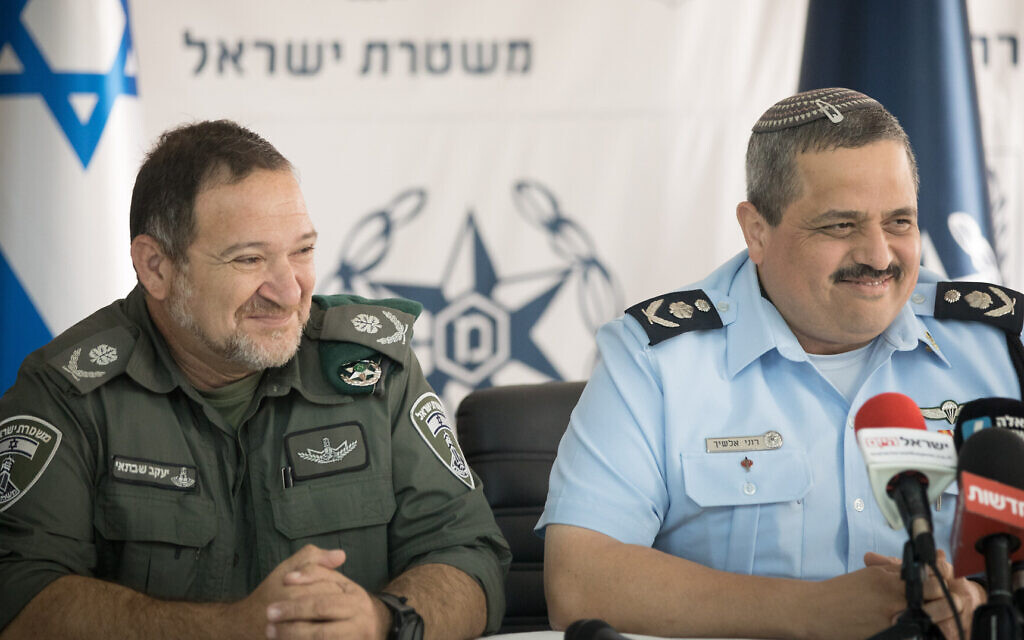 Then-police commissioner Roni Alsheich (right) with then-commander of the Border Police (the current police chief) Kobi Shabtai at a press conference near Jerusalem, March 27, 2018. (Yonatan Sindel/Flash90) Then-police commissioner Roni Alsheich (right) with then-commander of the Border Police (the current police chief) Kobi Shabtai at a press conference near Jerusalem, March 27, 2018. (Yonatan Sindel/Flash90)