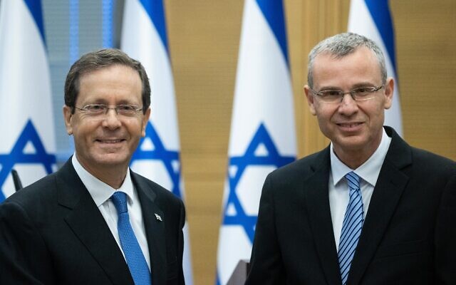 Isaac Herzog (left) and Yariv Levin at the Knesset in Jerusalem, June 2, 2021. (Yonatan Sindel/Flash90)