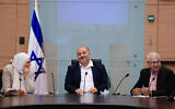Mansour Abbas, head of the Ra'am party, leads a faction meeting, in the Knesset on October 4, 2021. (Olivier Fitoussi/Flash90)
