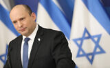 Prime Minister Naftali Bennett holds a press conference on COVID-19 in Tel Aviv, January 11, 2022. (Noam Revkin Fenton/Flash90)