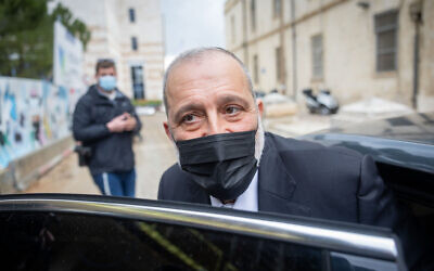 Shas party chairman Aryeh Deri seen after a being sentenced in a plea bargain for tax offense at the Jerusalem Magistrate's Court on February 1, 2022. (Yonatan Sindel/Flash90)