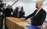 Former public security minister MK Amir Ohana arrives for his testimony at the state committee investigating the escape of security prisoners from the Gilboa prison, in Modi'in, February 3, 2022. (Flash90