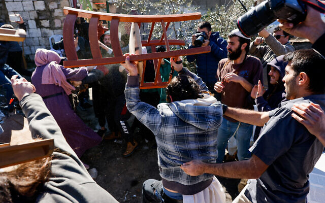 Israelis clash with Palestinians as far-right MK Itamar Ben Gvir arrives to open his office in the neighborhood, in the East Jerusalem neighborhood of Sheikh Jarrah, February 13, 2022. Photo by Olivier Fitoussi/Flash90 Israelis clash with Palestinians as far-right MK Itamar Ben Gvir arrives to open his office in the neighborhood, in the East Jerusalem neighborhood of Sheikh Jarrah, February 13, 2022. Photo by Olivier Fitoussi/Flash90