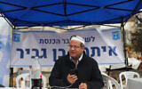 Religious Zionism MK Itamar Ben Gvir arrives at his makeshift office after his was apparently injured the night before in clashes  in the East Jerusalem neighborhood of Sheikh Jarrah, February 14, 2022. (Flash90)