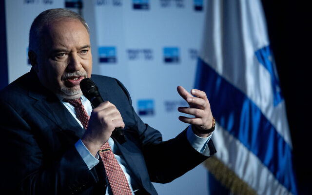 Finance Minister Avigdor Liberman speaks at a conference of the Israeli newspaper "Makor Rishon" at the International Convention Center in Jerusalem, February 21, 2022. (Yonatan Sindel/Flash90)
