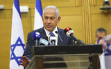 Likud leader Benjamin Netanyahu speaks at his party's faction meeting in the Knesset, February 28, 2022. (Yonatan Sindel/Flash90)