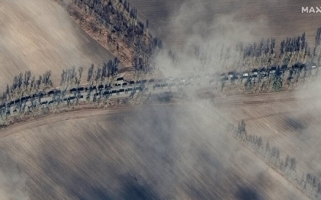 A satellite image taken February 27, 2022, by a private satellite company shows a large convoy of Russian forces some 40 miles northwest of Kyiv. (Maxar Technologies)