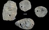 Four lead ingots dated to the 13th–early 12th century BCE that were found as part of a shipwreck cargo in the southern anchorage of Caesarea in Israel. (Ehud Galili/University of Haifa’s Institute for Maritime Studies)