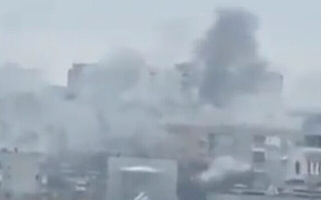 Smoke rises as shells land in Kharkiv during a Russian attack on February 28 (Screencapture/Twitter Smoke rises as shells land in Kharkiv during a Russian attack on February 28 (Screencapture/Twitter