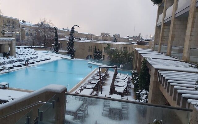 Swimming in the heated David Citadel pool during the snowy January 2022 weekend (Courtesy David Citadel Hotel)