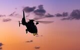 In an undated photograph, an Israeli navy AS565 Panther helicopter is seen flying during sunset. (Israel Defense Forces)