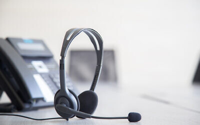 Illustrative: A desk at a support call center. (Kunakorn Rassadornyindee; iStock by Getty Images)