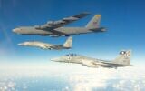 Israeli F-15 fighter jets escort an American B-52 bomber through Israeli airspace en route to the Persian Gulf on February 14, 2022. (Israel Defense Forces)