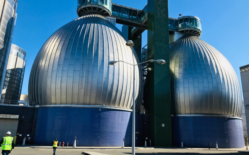 These futuristic silvery egg-shaped silos at the Newtown Creek Wastewater Treatment Plant convert New York's sewage into biogas. At 145 feet high and 80 feet in diameter, each egg holds about 3 million gallons of sludge, converting it into 2 million cubic feet of gas every day. The plant conducts tours of the eggs on Valentine's Day, Earth Day, and Halloween. (Credit: Lina Zeldovich)