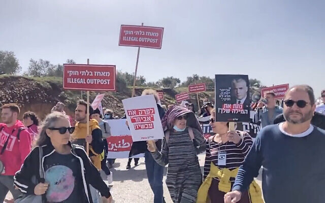 Left-wing activists and lawmakers march near the illegal West Bank outpost of Evyatar, February 18, 2022. (Screenshot: Twitter) Left-wing activists and lawmakers march near the illegal West Bank outpost of Evyatar, February 18, 2022. (Screenshot: Twitter)