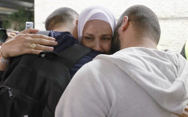 Israeli passengers arriving from Ukraine via the border with Romania on an Israeli 'Israir' rescue flight are welcomed by their family upon arrival at Israel's Ben Gurion airport in Lod, near Tel Aviv, on March 1, 2022. (Jack Guez/AFP) Israeli passengers arriving from Ukraine via the border with Romania on an Israeli 'Israir' rescue flight are welcomed by their family upon arrival at Israel's Ben Gurion airport in Lod, near Tel Aviv, on March 1, 2022. (Jack Guez/AFP)