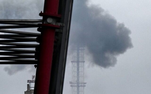 Smoke billows over Kyiv after a missile attack targeting the Ukrainian capital's television tower in Kyiv on March 1, 2022. (ARIS MESSINIS / AFP)