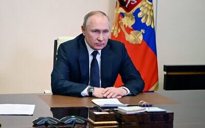 Russian President Vladimir Putin chairs a meeting with members of the Security Council via teleconference call at the Novo-Ogaryovo state residence outside Moscow, Russia, on March 3, 2022. (Andrey Gorshkov/Sputnik/AFP)