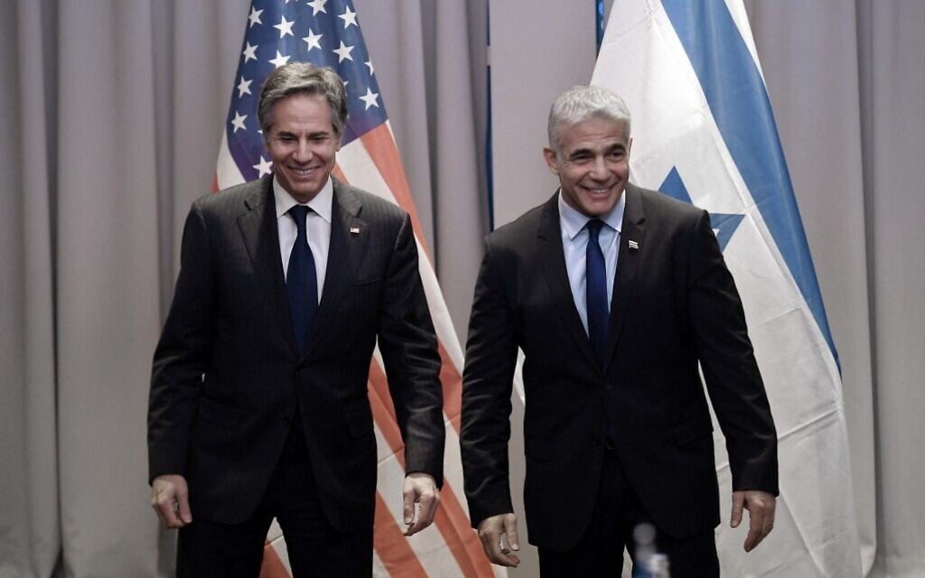 US Secretary of State Antony Blinken (L) meets with Foreign Minister Yair Lapid in Riga, Latvia, on March 7, 2022. (Olivier Douliery/Pool/AFP)