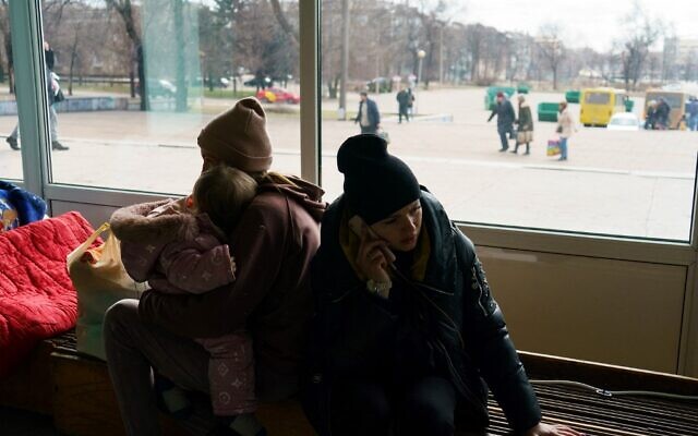 Evacuees from Mariupol wait at the Zaporizhzhya State Circus for transportation to other locations in the city of Zaporizhzhia on March 16, 2022. (Emre CAYLAK / AFP) Evacuees from Mariupol wait at the Zaporizhzhya State Circus for transportation to other locations in the city of Zaporizhzhia on March 16, 2022. (Emre CAYLAK / AFP)