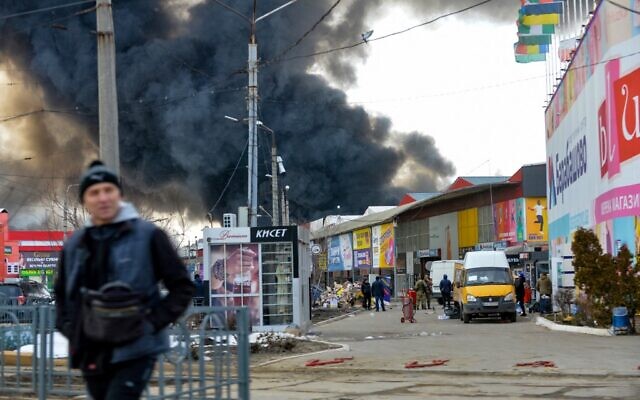 Black smoke rises into the sky from the Barabashovo market which was reportedly hit by shelling, in Kharkiv, on March 17, 2022, amid the ongoing Russia's invasion of Ukraine. (Sergey Bobok/AFP) Black smoke rises into the sky from the Barabashovo market which was reportedly hit by shelling, in Kharkiv, on March 17, 2022, amid the ongoing Russia's invasion of Ukraine. (Sergey Bobok/AFP)