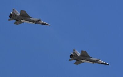 This file photo taken on May 9, 2018 shows Russia's MiG-31 supersonic interceptor jets carrying hypersonic 'Kinzhal' (Dagger) missiles flying over Red Square during the Victory Day military parade in Moscow. (AFP)