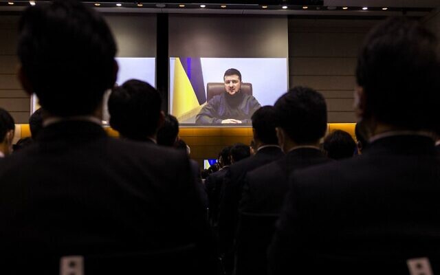 Ukrainian President Volodymyr Zelensky speaks to members of Japan's lower house of parliament via a video link at the House of Representatives office building in Tokyo on March 23, 2022. (BEHROUZ MEHRI / POOL / AFP)