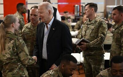 US President Joe Biden meets service members from the 82nd Airborne Division, who are contributing alongside Polish Allies to deterrence on the Alliance's Eastern Flank, in the city of Rzeszow in southeastern Poland, around 100 kilometers (62 miles) from the border with Ukraine, March 25, 2022. (Brendan SMIALOWSKI / AFP)