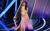 Mila Kunis speaks onstage during the 94th Annual Academy Awards at Dolby Theatre on March 27, 2022 in Hollywood, California.   (Neilson Barnard/Getty Images/AFP)