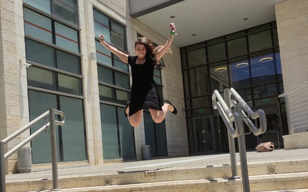 Esty Sompo jumps for joy after her former husband agreed to give her a ritual Jewish divorce on June 24, 2021. (Courtesy) Esty Sompo jumps for joy after her former husband agreed to give her a ritual Jewish divorce on June 24, 2021. (Courtesy)