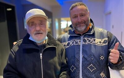Evgeny Pavlovskiy and his son, Mykhailo Pavlovskiy, reunited in Warsaw after he managed to leave Ukraine. (Courtesy/ via JTA)
