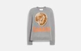 The gray sweater pays tribute to the Upper West Side food emporium and retails for $495. (Coach)
