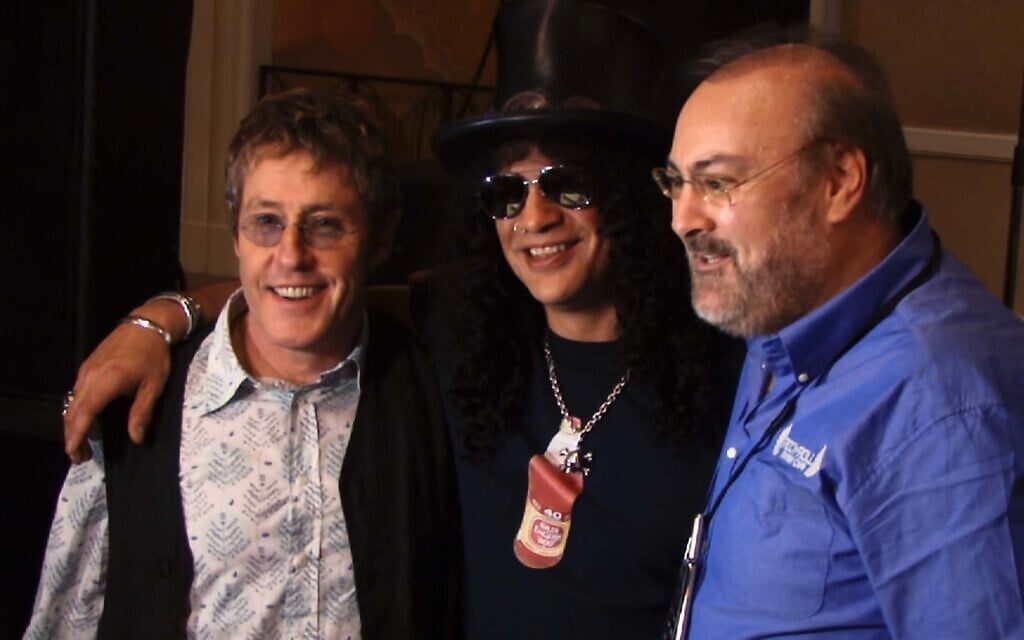 David Fishof, right, with Roger Daltrey, left, and Slash in 2007. (Rock and Roll Fantasy Camp/ via JTA)