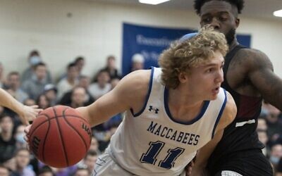 Ryan Turell, a 6-foot-7 guard who has entered the NBA draft, hopes to become the league’s first Orthodox player. (Joe Bednarsh and Adena Stevens/ via JTA)
