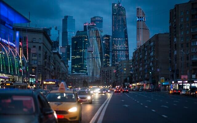 Illustrative: Traffic moves along the multi-lane highway in Moscow, with the modern city skyscrapers illuminating the skyline in Moscow, Russia, on July 8, 2016. (AP Photo/Alexander Zemlianichenko) Illustrative: Traffic moves along the multi-lane highway in Moscow, with the modern city skyscrapers illuminating the skyline in Moscow, Russia, on July 8, 2016. (AP Photo/Alexander Zemlianichenko)