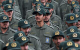 In this Feb. 11, 2019 file photo, Iranian Revolutionary Guard members attend a ceremony celebrating the 40th anniversary of the Islamic Revolution, at the Azadi, or Freedom, Square in Tehran, Iran. (AP Photo/Vahid Salemi)