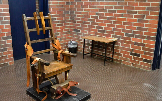 This March 2019, file photo, provided by the South Carolina Department of Corrections shows the state's electric chair in Columbia, S.C. South Carolina Gov. Henry McMaster signed into law last week a bill that would essentially restart the state's stalled death penalty after a lack of lethal injection drugs has delayed several executions. The new law would let condemned inmates choose between the electric chair or a newly formed firing squad. (Kinard Lisbon/South Carolina Department of Corrections via AP, File) This March 2019, file photo, provided by the South Carolina Department of Corrections shows the state's electric chair in Columbia, S.C. South Carolina Gov. Henry McMaster signed into law last week a bill that would essentially restart the state's stalled death penalty after a lack of lethal injection drugs has delayed several executions. The new law would let condemned inmates choose between the electric chair or a newly formed firing squad. (Kinard Lisbon/South Carolina Department of Corrections via AP, File)