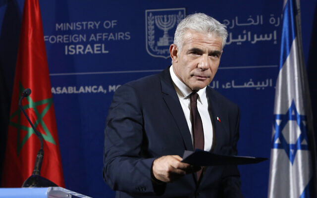 Israeli Foreign Minister Yair Lapid gestures as he speaks to media during a press conference in Casablanca, Morocco, on August 12, 2021. (AP Photo/ Abdeljalil Bounhar) Israeli Foreign Minister Yair Lapid gestures as he speaks to media during a press conference in Casablanca, Morocco, on August 12, 2021. (AP Photo/ Abdeljalil Bounhar)