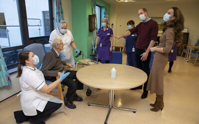 Illustrative image: Britain's Prince William and Kate, Duchess of Cambridge speak to patient William Taylor, 94 , during a visit to the Clitheroe Community Hospital, in Lancashire, England, Thursday, Jan. 20, 2022, to learn about the challenges faced by rural health providers in the face of the coronavirus pandemice. (James Glossop/Pool Photo via AP)