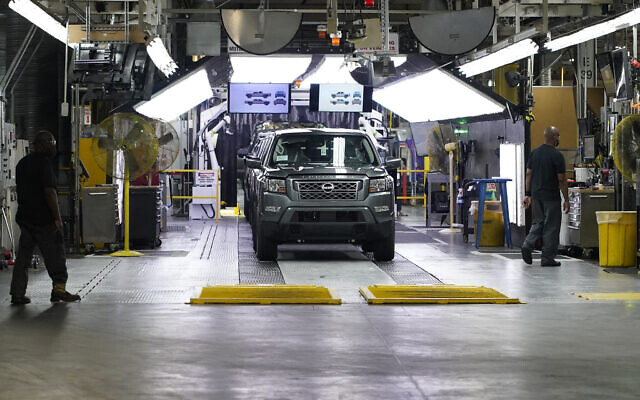 Illustrative -- Technicians make adjustments on Frontier trucks at Nissan's Canton Vehicle Assembly Plant, Feb. 17, 2022, in Canton, Mississippi (AP Photo/Rogelio V. Solis) Illustrative -- Technicians make adjustments on Frontier trucks at Nissan's Canton Vehicle Assembly Plant, Feb. 17, 2022, in Canton, Mississippi (AP Photo/Rogelio V. Solis)