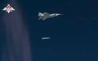 This photo taken from video provided by the Russian Defense Ministry Press Service Feb. 19, 2022, shows a MiG-31K fighter of the Russian air force dropping a Kinzhal hypersonic cruise missile during a military drills. (Russian Defense Ministry Press Service via AP)