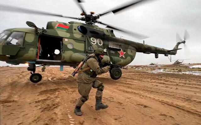 In this frame from video provided by the Russian Defense Ministry Press Service on February 19, 2022, a Russian marine runs during the Union Courage-2022 Russia-Belarus military drills at the Obuz-Lesnovsky training ground in Belarus. (Russian Defense Ministry Press Service via AP, File) In this frame from video provided by the Russian Defense Ministry Press Service on February 19, 2022, a Russian marine runs during the Union Courage-2022 Russia-Belarus military drills at the Obuz-Lesnovsky training ground in Belarus. (Russian Defense Ministry Press Service via AP, File)