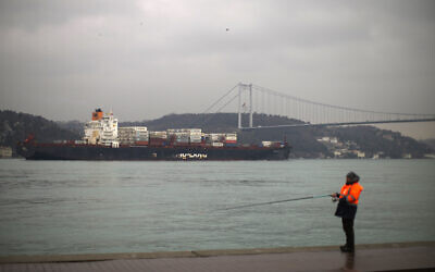 Cargo ship Oakland crosses the Bosphorus strait towards the Marmara sea after departing from Russia's Novorossiysk port, in Istanbul, Tuesday, March 1, 2022. Turkey, which is trying to balance its support for Ukraine with its fragile economic ties to Russia, said Monday it is implementing an international convention that allows the country to shut down the straits at the entrance of the Black Sea to warships, to avoid an escalation of the conflict. (AP/Francisco Seco)
