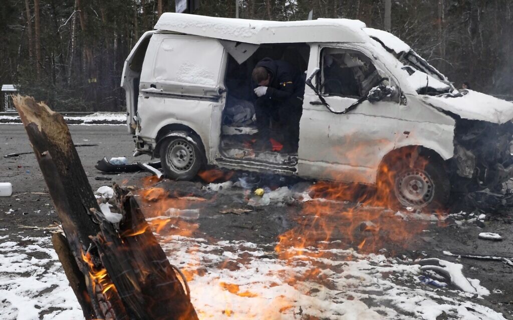 A man reacts inside a vehicle damaged by shelling, in Brovary, outside Kyiv, Ukraine, on March 1, 2022. (AP Photo/Efrem Lukatsky) A man reacts inside a vehicle damaged by shelling, in Brovary, outside Kyiv, Ukraine, on March 1, 2022. (AP Photo/Efrem Lukatsky)