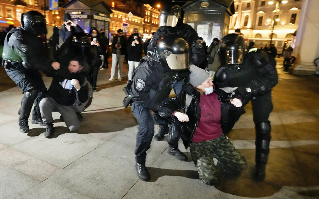 Police detain demonstrators during a demonstration against Russia's attack on Ukraine in St. Petersburg, Russia, March 1, 2022. (AP Photo/Dmitri Lovetsky)